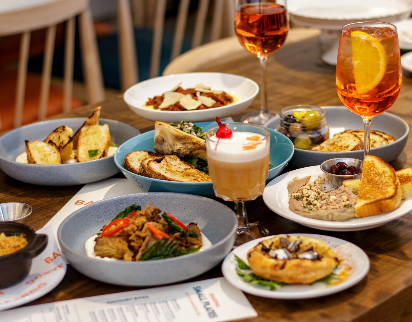 Overhead appetizer spread, restaurant food photography